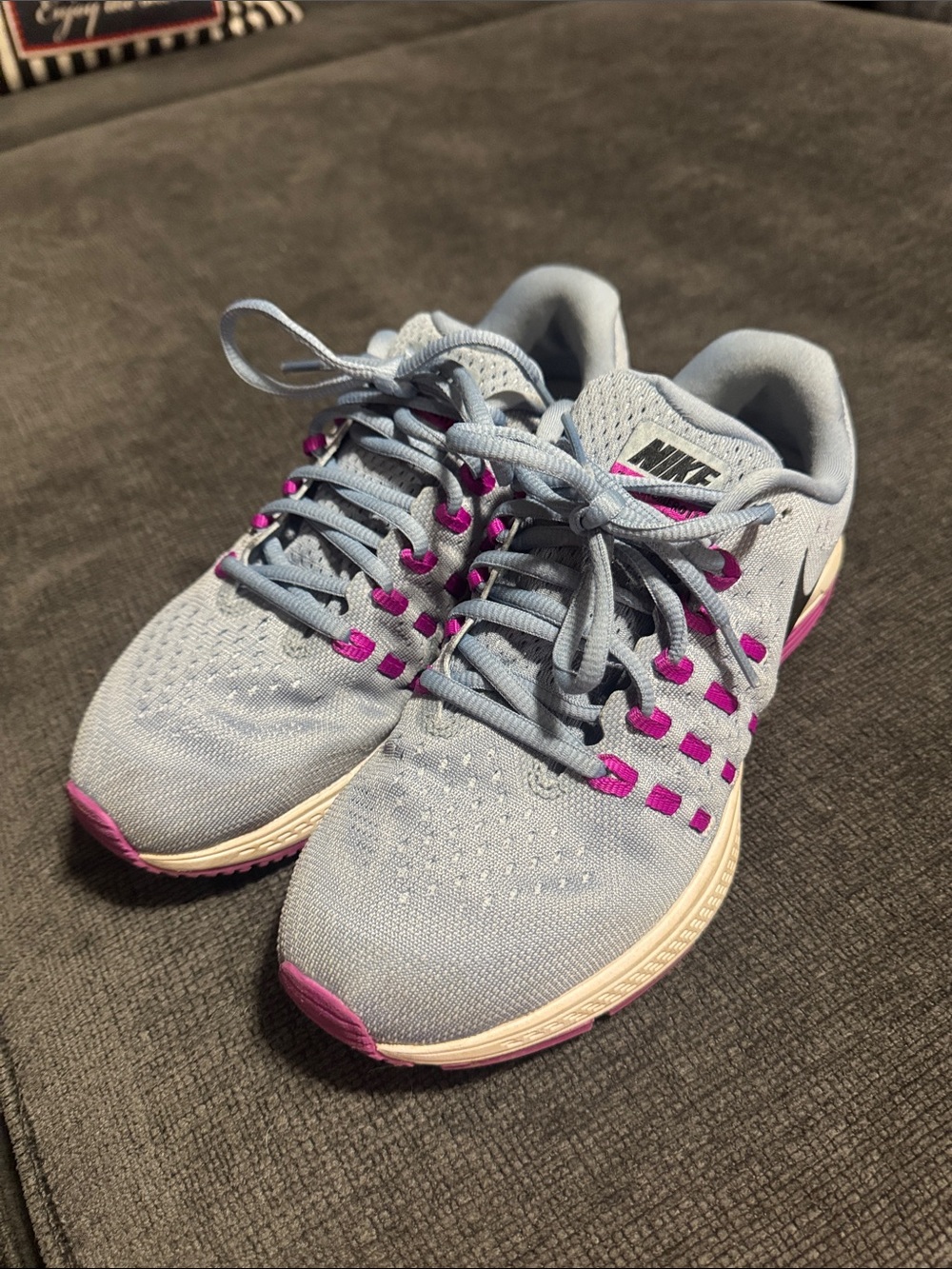 Nike Women's Light Blue Running Sneakers with Pink Accents